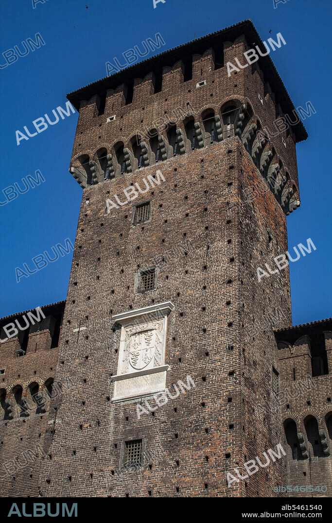 Milan, Lombardy, Italy, Europe. Sforza's Castle (Castello Sforzesco), was built in 15th Century by duke Francesco Sforza, is situated in the center of the city. The castle courtyard. Bona's Tower (Torre di Bona), built in 1477.