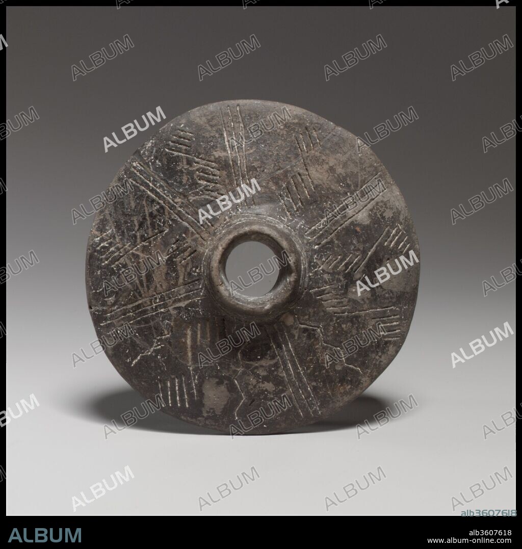 Terracotta disk. Culture: Cypriot. Dimensions: diameter  3 3/8 in. (8.6 cm). Date: ca. 1900-1725 B.C..
These disks may be among the earliest representations of wheels from Cyprus.