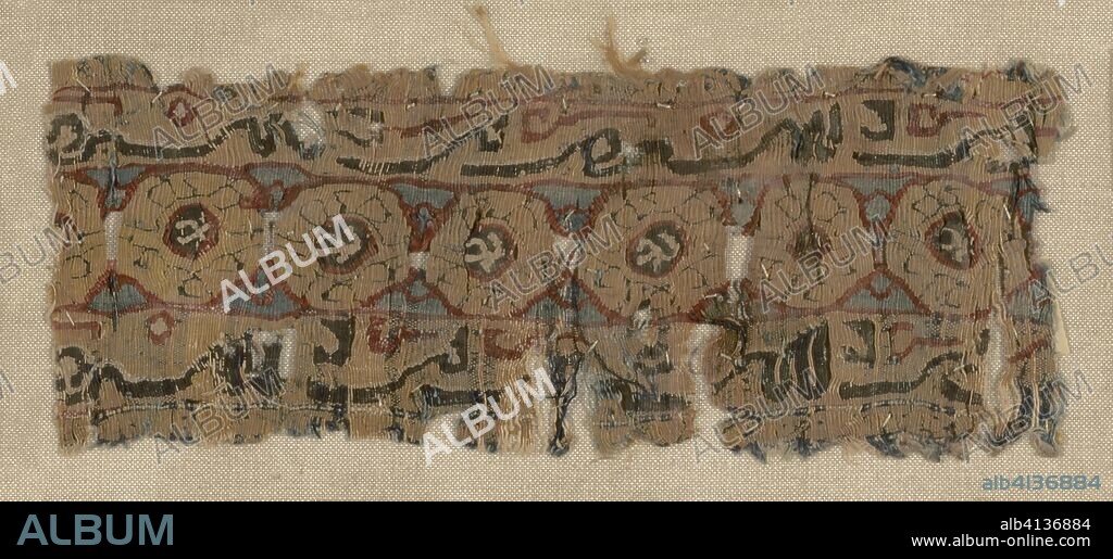 ISLAMIC. Fragment. Egypt. Date: 969 AD-1171. Dimensions: 4.8 × 12.4 cm (1 7/8 × 4 7/8 in.). Border fragment, tapestry silk weft on dark blue silk warp; twisted rope design in yellow on outside edges. Origin: Egypt.