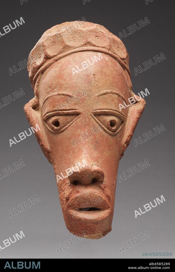 Head, 600 BC-AD 250. The Nok culture of central Nigeria initiated sub-Saharan Africa?s earliest known sculptural tradition by around 600 BC. Artists modeled coarse-grained clay by hand to produce human and animal effigies of unknown function. Although probably a fragment of a nearly life-size male seated figure, this head is remarkably well preserved. The artist combined boldly exaggerated proportions with carefully rendered details. These include indentations on the eyelids and brows, scarification on the cheeks, and teeth inside the parted lips. This head is an excellent example of the style of Katsina Ala, from the southeastern portion of the Nok civilization?s distribution area. The Nok civilization is considered to be the oldest Iron Age culture of sub-Saharan Africa.  Nok sculptures were first discovered in 1928 during tin-mining operations; others were discovered in riverbeds or under the roots of trees. The Nok terracottas may have been part of a shrine or temple or were placed on a tomb. The identities of the portrayed figures are also unknown, but the adornments and elaborate hairstyles and headdresses seem to indicate that they represent notables or leaders.