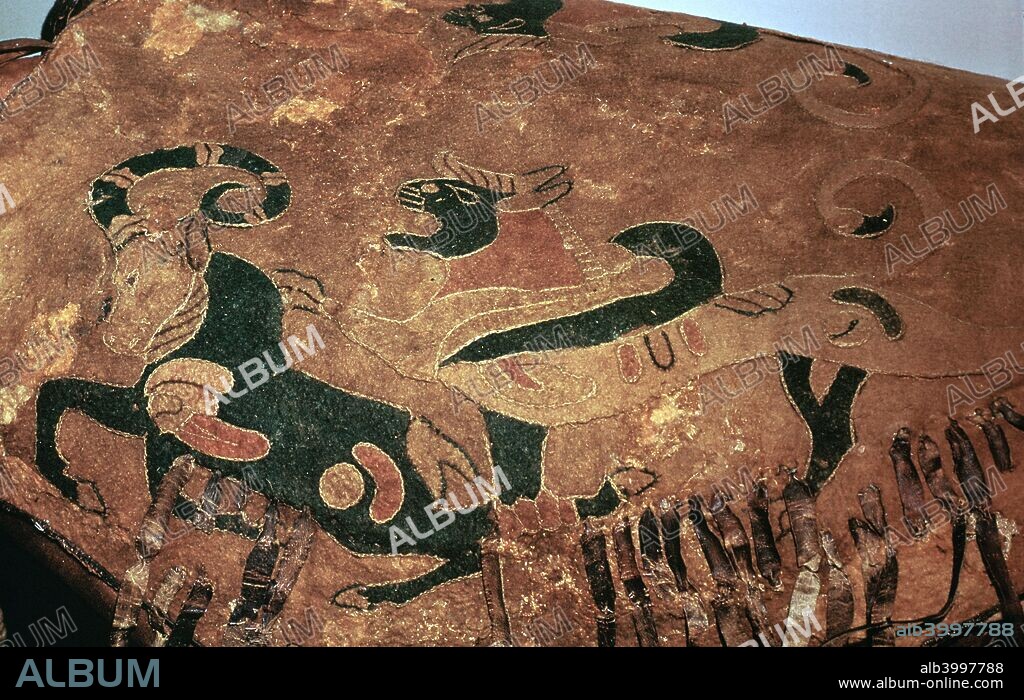 Scythian saddle-cover with applied felt decoration showing a gryphon attack from Barrow I, Pazyryk, Altai, 5th century BC.