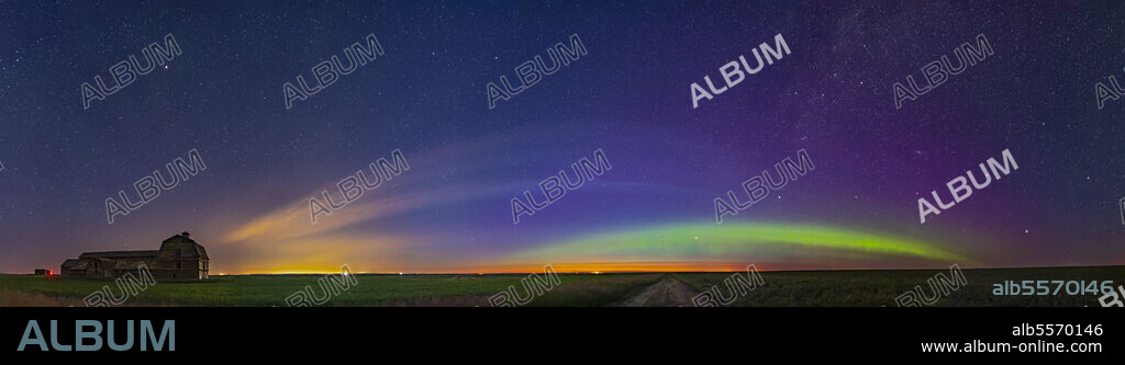 A 150 degree panorama of an arc of diffuse aurora to the northeast