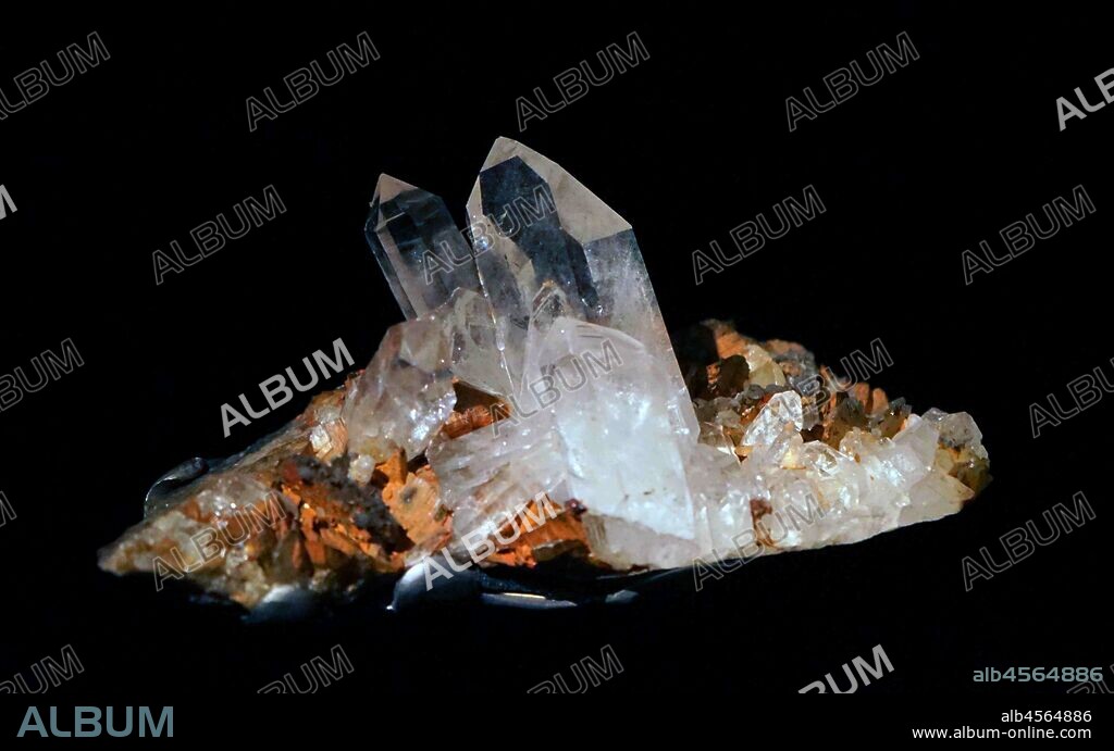 Quartz is a mineral composed of silicon and oxygen atoms in a continuous framework of SiO4 silicon-oxygen tetrahedra, with each oxygen being shared between two tetrahedra, giving an overall chemical formula of SiO2. Quartz is the second most abundant mineral in Earth's continental crust, behind feldspar.