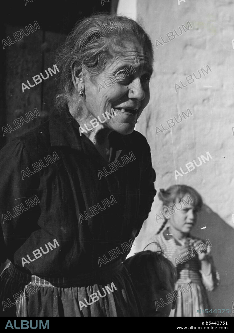 Face of an old granny, living near the town, was lined and worn. June 1,  1949. (Photo by Steven Henty, Pictorial Press). - Album alb5443751