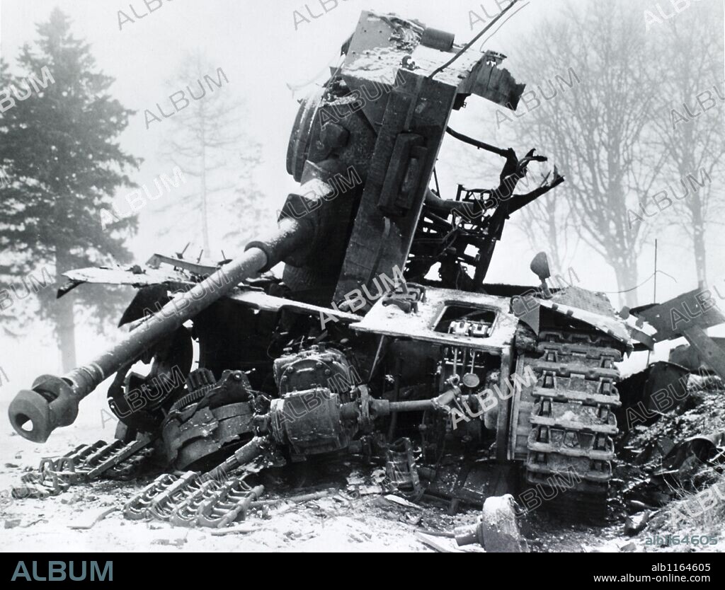 This nazi tank was knocked-out by the Americans near Bastogne, Belgium, where a small garrison of US Airborne troops held out for nine days, repulsing successive enemy attacks.400 enemy tanks were knocked out and several hundred more were damaged during t.