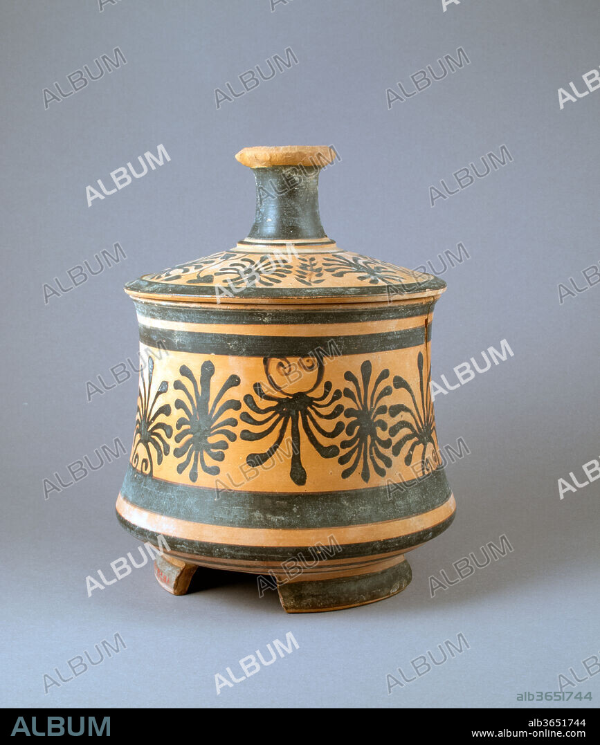 Pyxis with lid. Culture: Greek, Boeotian. Dimensions: Diameter: 5 × 4 1/2 × 3 7/8 in. (12.7 × 11.4 × 9.8 cm)
Height: 6 1/4 in. (15.9 cm)
Diameter (Lid): 4 11/16 in. (11.9 cm)
Height (height of lid): 2 9/16 in. (6.5 cm). Date: late 5th century B.C..
Decorated with palmettes.