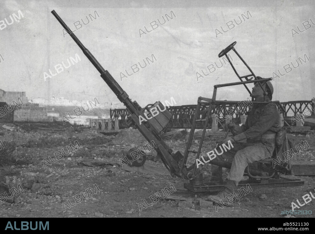 The 20 mm (Land Based) Oerlikon AA. Gun (First Pictures) -- 20mm. Land-Based Oerlikon mobile Ack-Ack gun in action in Italy. 
The Oerlikon is famous as a naval anti-aircraft gun. Now it has been adapted for use by the army against low-flying aircraft. It is used largely by Airborne Forces. October 31, 1944. (Photo by British Official Photo).