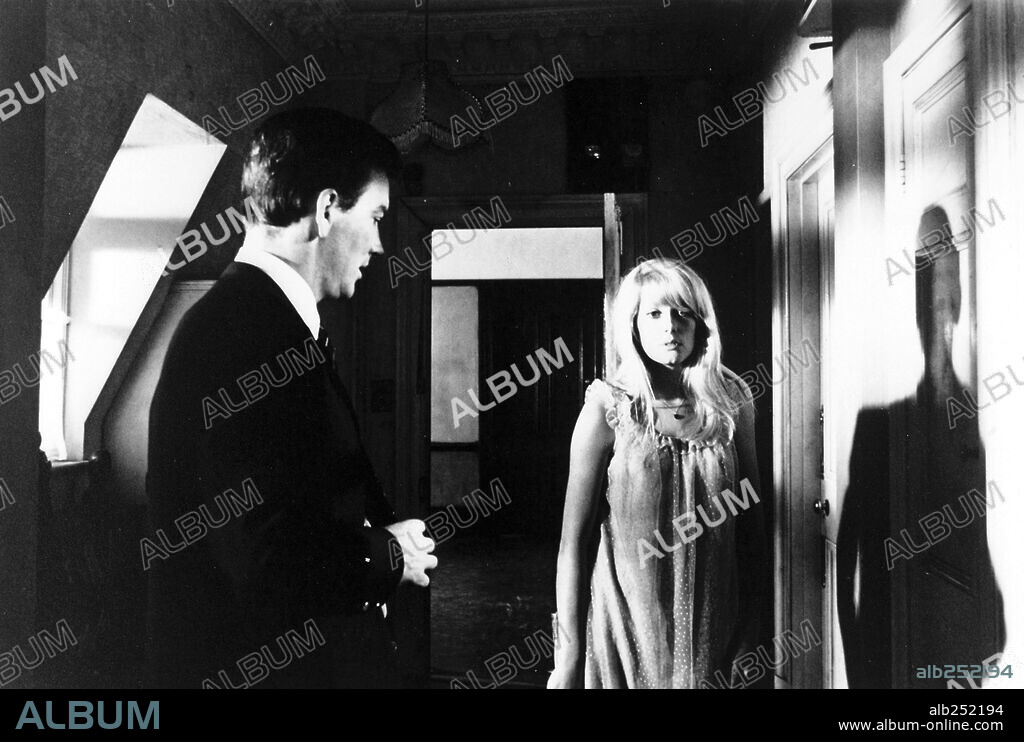 CATHERINE DENEUVE and JOHN FRASER in REPULSION, 1965, directed by ROMAN POLANSKI. Copyright COMPTON-TEKLI/ROYAL.