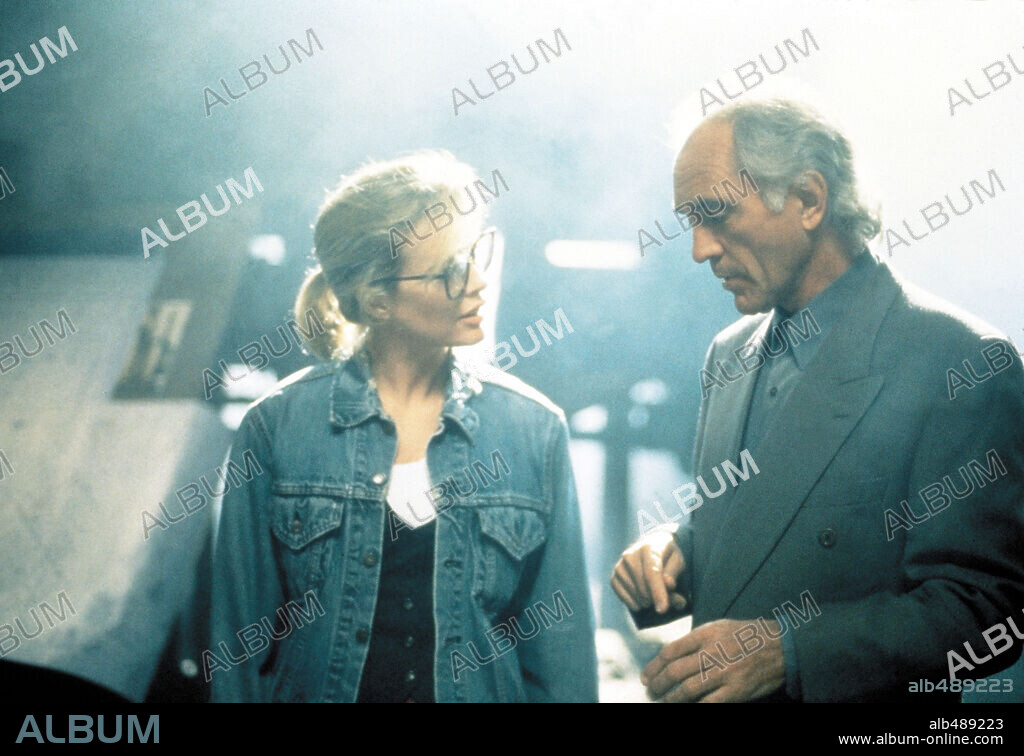 KIM BASINGER and TERENCE STAMP in THE REAL MCCOY, 1993, directed by RUSSELL MULCAHY. Copyright CAPELLA INTERNATIONAL.