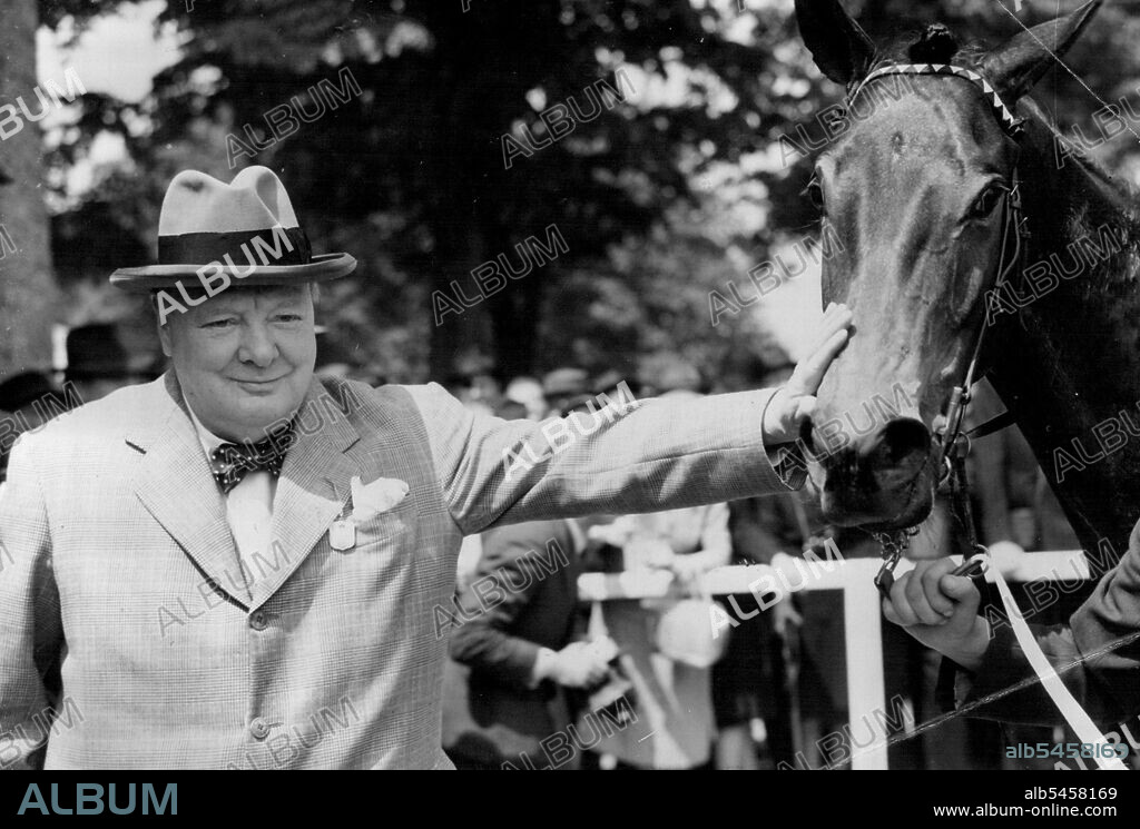 Well Done, Kid - Mr. Winston Churchill has a victory pat for his winning colt, Canyon Kid, after the race.
Mr. Winston Churchill was at Windsor, Berkshire Races to-day (Wednesday) to see his new two-year-old Canyon Kid win its first race-the Speedy Stakes, over five furlongs.
T. Gosling rode the colt to Victory, beating Lady de Trafford's Rasselas, W.H. Carr up, and Mr. Morry Levy's Mysterious Lad, with Gordon Richards in the Saddle. May 31, 1950. (Photo by Reuterphoto).