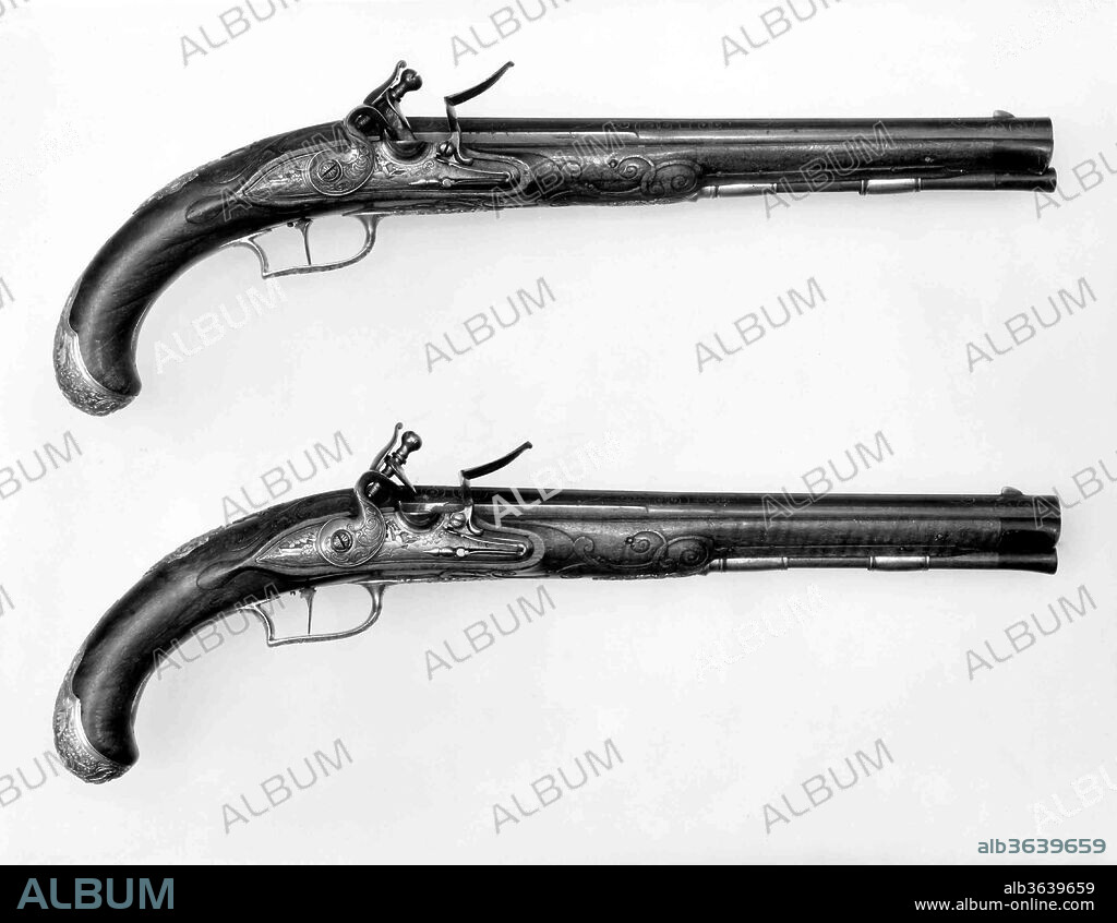 Pair of Flintlock Pistols. Culture: German, Regensburg. Dimensions: L. 16 3/4 in. (42.6 cm); L. of barrel 11 1/4 in. (28.6 cm); L. of lockplate 4 1/2 in. (11.4 cm); Cal. .56 in. (14.2 mm); Wt. 1 lb. 13 oz. (822 g). Gunsmith: Johann Andreas Kuchenreuter (German, Regensburg, 1716-1795). Date: ca. 1760-70.
Several generations of the Kuchenreuter family were highly successful gunsmiths whose patrons included the King of Bohemia, Napoleon, and the Tsar of Russia. Johann Andreas and his father Johann Jacob were among the most famous members of this gun-making dynasty.