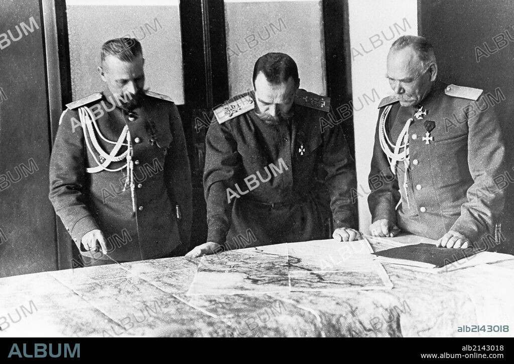 The first world war, supreme commander-in-chief tsar nicholas ll with general (infantry) alexeyev, chief of staff, and major-general pustovoitenko, quarter-master of the staff, looking over a map in november 1915, mogilev, byelorussia. 01/02/2013