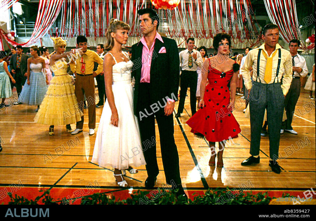 OLIVIA NEWTON JOHN, OLIVIA NEWTON JOHN and TRAVOLTA JOHN. 1977 - Hollywood, California, U.S. - Actors OLIVIA NEWTON JOHN with JOHN TRAVOLTA during a dance scene while filming of the movie 'GREASE' in 1977. (Credit Image: © Phil Roach/Globe Photos via ZUMA Wire).