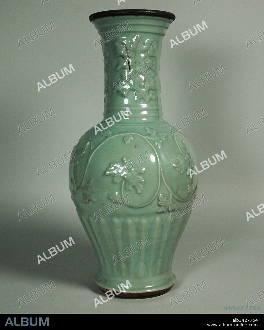 Vase with Peony Scrolls, Yuan dynasty (1271–1368), mid-14th century, China, Porcelain with molded decoration under celadon glaze (Longquan ware), H. 19 1/2 in. (49.5 cm); Diam. 11 in. (27.9 cm), Ceramics, Developed at the Longquan kilns in the late thirteenth century, this type of vase was produced there well into the Ming dynasty (1368–1644). The decoration of molded peonies is an innovation of these kilns, and is frequently found on works produced there in the thirteenth and fourteenth centuries.