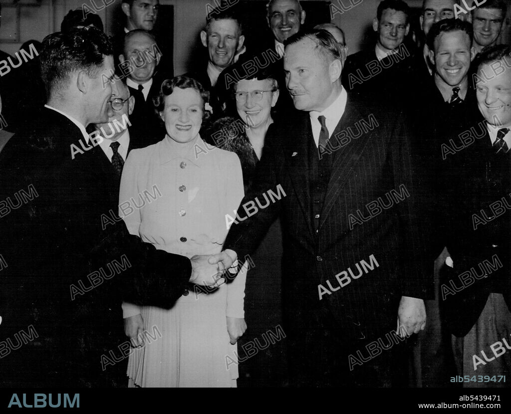 The Governor-General of New Zealand, Sir Bernard Freyberg V.C., wishes F.R.Allen good luck during the fare well at Government House, Auckland. Lady Freyberg is in the centre. May 3, 1949.