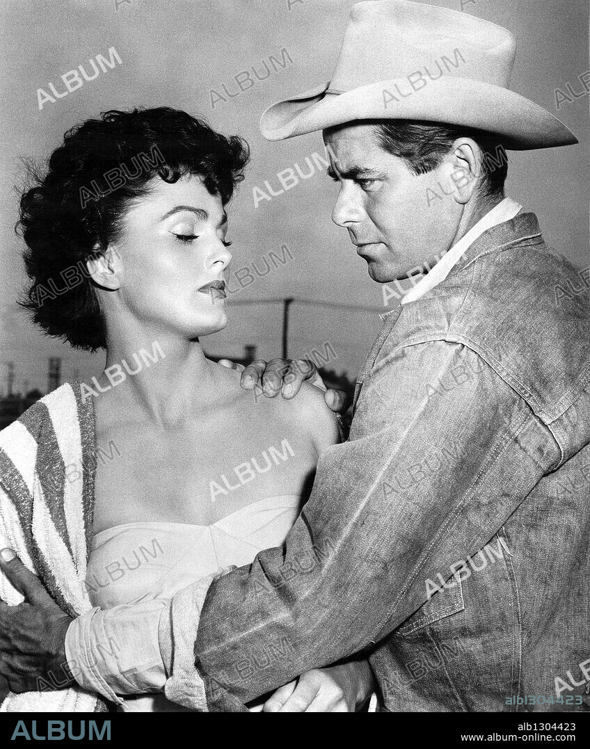 GLENN FORD and URSULA THIESS in THE AMERICANO, 1955, directed by WILLIAM CASTLE. Copyright RKO.