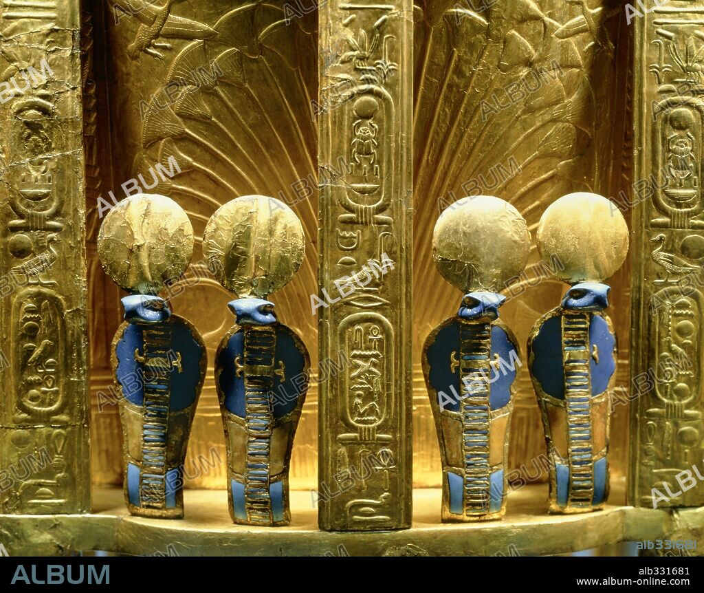 Reverse of throne of Tutankhamon gold with lapis lazuli and gold uraeus cobra figures, 18 Dynasty 1347-37 BC.