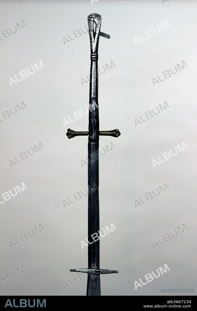 Two-Handed Sword. Culture: Indian, Assam, Naga. Dimensions: L. 46 3/8 in. (117.8 cm); W. 3 3/4 in. (9.5 cm); D. 9/16 in. (1.4 cm); Wt. 2 lb. 7 oz. (1105.6 g). Date: 19th century.