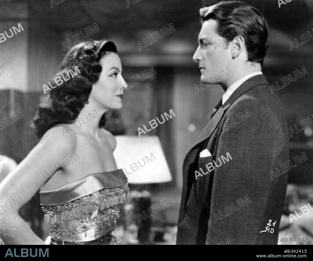 CARLOS THOMPSON and MARIA FELIX in NAKED PASSION, 1953 (LA PASION DESNUDA).  Copyright INTERAMERICANA. - Album alb342415