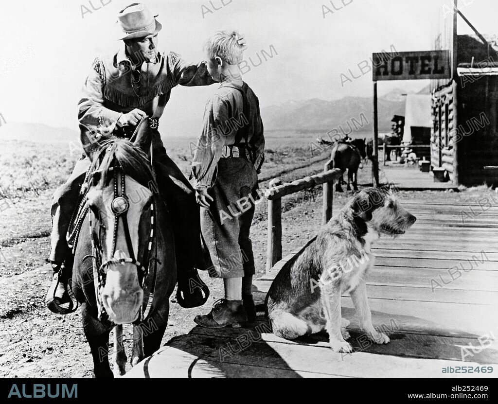 ALAN LADD and BRANDON DE WILDE in SHANE, 1953, directed by GEORGE STEVENS. Copyright PARAMOUNT PICTURES.