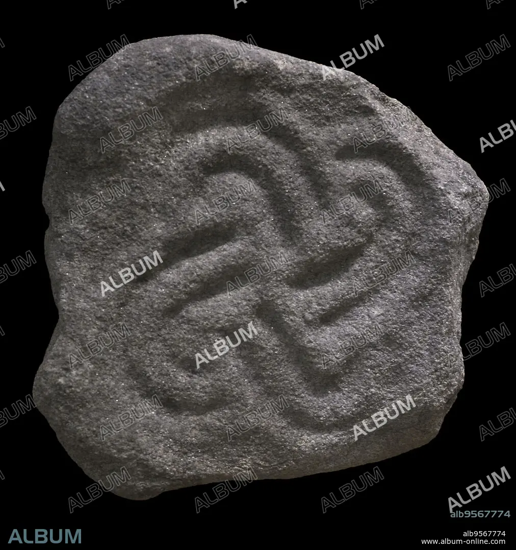 Prehistory. Iron Age. Architectural element depicting a tetraskelion ...