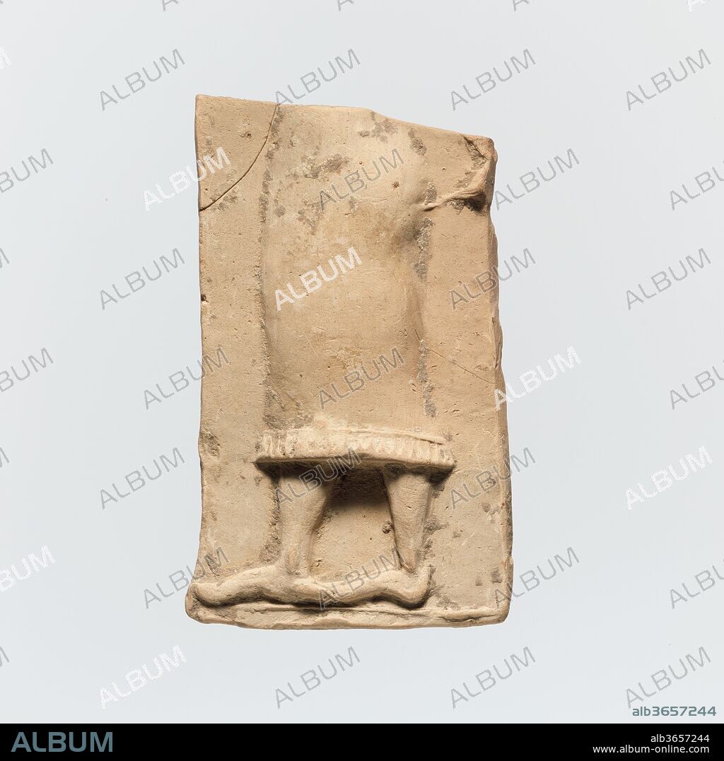 Fragment of a terracotta plaque. Culture: Greek, Cretan. Dimensions: 2 7/8 in. x 1 3/4 in. (7.3 cm x 4.4 cm). Date: 7th century B.C..
Lower body of a youth in a long garment.