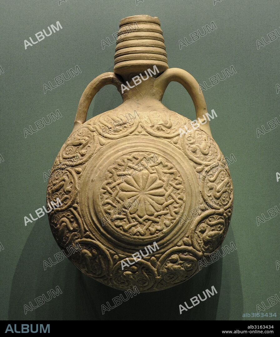 Near East. Middle Ages. Ampulla. Globular bottle with two handles. Used for holy water or holy oil (pilgrimages). The State Hermitage Museum. Saint Petersburg. Russia.