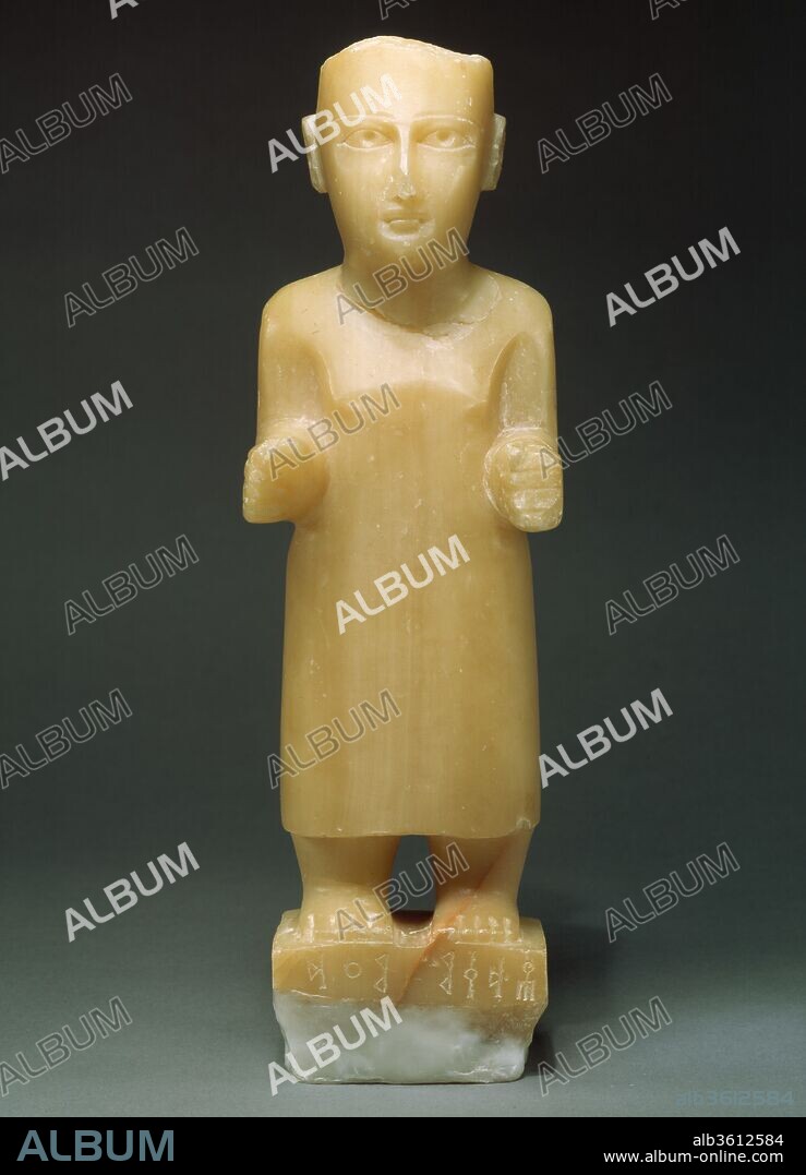 Standing male figure. Dimensions: H. 14 13/16 × W. 4 1/2 × D. 4 3/16 in. (37.6 × 11.5 × 10.7 cm). Date: ca. late 1st millennium B.C..
This standing male figure is a funerary or votive object intended to be placed in a tomb or temple. Dressed in a long, plain garment reaching almost to the ankles, the figure stands in a fully frontal pose. The base, which is carved in one piece with the figure, bears the name of the individual and his clan--Sadiqim Ma'ad. The eyes and eyebrows are carved to hold inlays, now missing, and the arms are bent at the elbows, extending out at right angles to the body. One hand is clenched in a fist, pierced vertically to hold some object, perhaps a scepter, now lost. The other hand is open. The undersurface of the base and the top and back of the figure's head are roughly carved. Such statues were often set in niches, and the surfaces not visible were consequently left unfinished on many examples. The placement of the ears high on the head, the aquiline nose, the small mouth, and the fully frontal pose are all characteristic of human images made in this region.