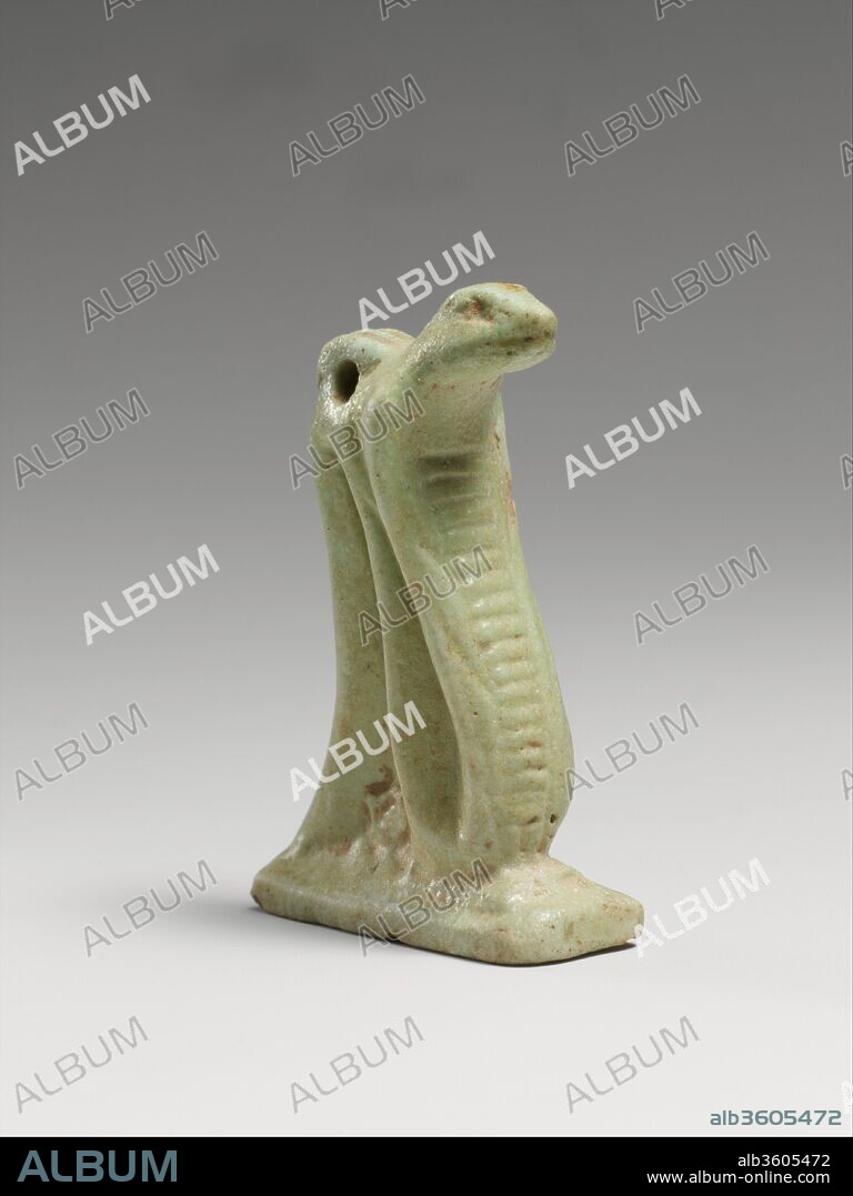 Faience snake amulet. Culture: Egyptian. Dimensions: H.: 1 9/16 in. (4 cm). Date: 664-30 B.C..
Amulets representing animals were attributed to a deity: a hawk for Ra, the Sun God, a lion for Sakhmi, the War Goddess, a ram for Khnum and a cat for Bast. Snakes were symbols of royalty.