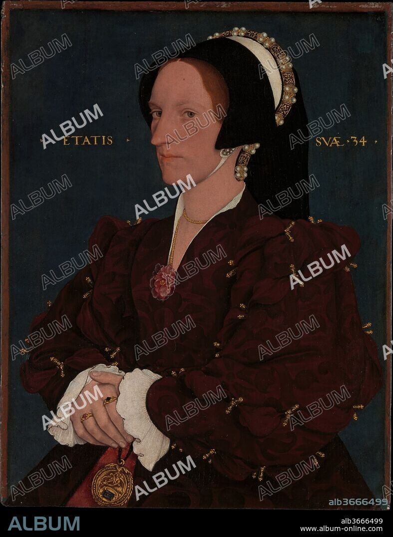 Lady Lee (Margaret Wyatt, born about 1509). Artist: Workshop of Hans Holbein the Younger (German, Augsburg 1497/98-1543 London). Dimensions: 17 3/8 × 13 3/8 in. (44.1 × 34 cm). Date: early 1540s.
Lady Lee, born Margaret Wyatt, grew up in a family closely connected to the court of Henry VIII. Her father, Henry Wyatt, served as treasurer of the king's chamber, and her brother, Thomas, was the foremost Tudor poet and an ambassador. She is shown here at the age of thirty-four, sumptuously dressed in the courtly fashion of the early 1540s. The painting is close to the manner of Holbein, but the attention paid to decorative effects and linear details at the expense of life-like portrayal of the sitter is indicative of workshop production. The portrait was likely based on a Holbein drawing.