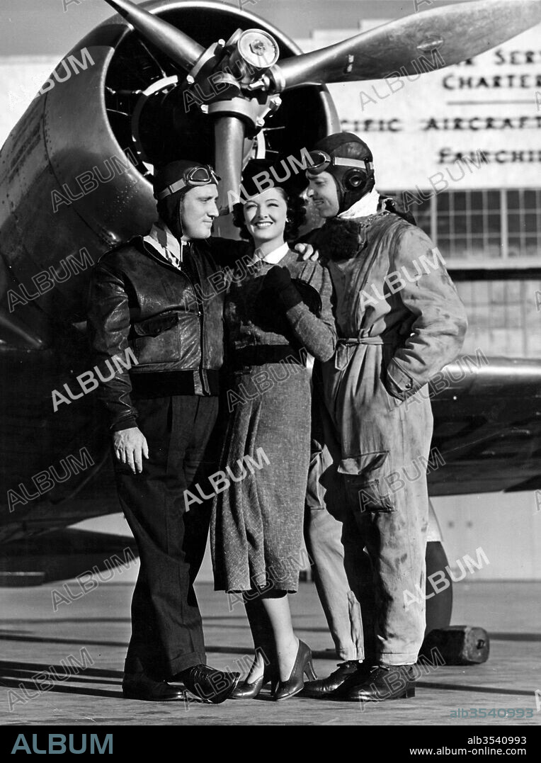 Clark Gable, MYRNA LOY and TRACY SPENCER. CLARK GABLE, MYRNA LOY and SPENCER TRACY in TEST PILOT, 1938, directed by VICTOR FLEMING. Copyright M.G.M.