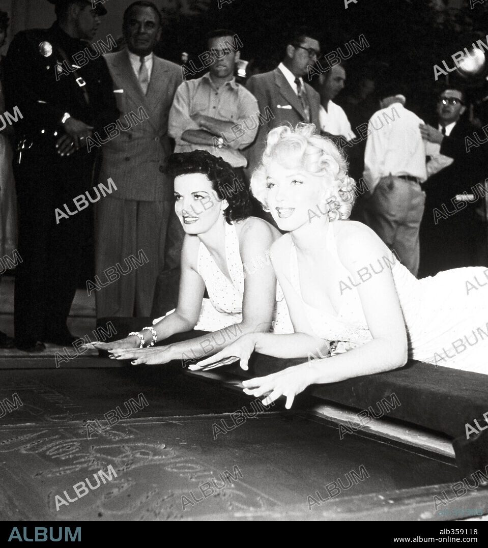 NORMA JEAN BAKER and JANE RUSSELL. JANE RUSSELL and MARILYN MONROE in GENTLEMEN PREFER BLONDES, 1953, directed by HOWARD HAWKS. Copyright 20TH CENTURY FOX.