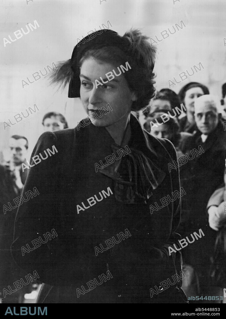 Princess Elizabeth Sees Furniture Exhibition. A happy picture of Princess Elizabeth taken when she visited the British Furniture Trades Exhibition which has opened at Earl's Court here. It is the first national exhibition for furniture to be held for over eleven years, and is for the trade only. ***** Nearly 400 manufacturers are showing their latest designs at the exhibition. February 14, 1950.