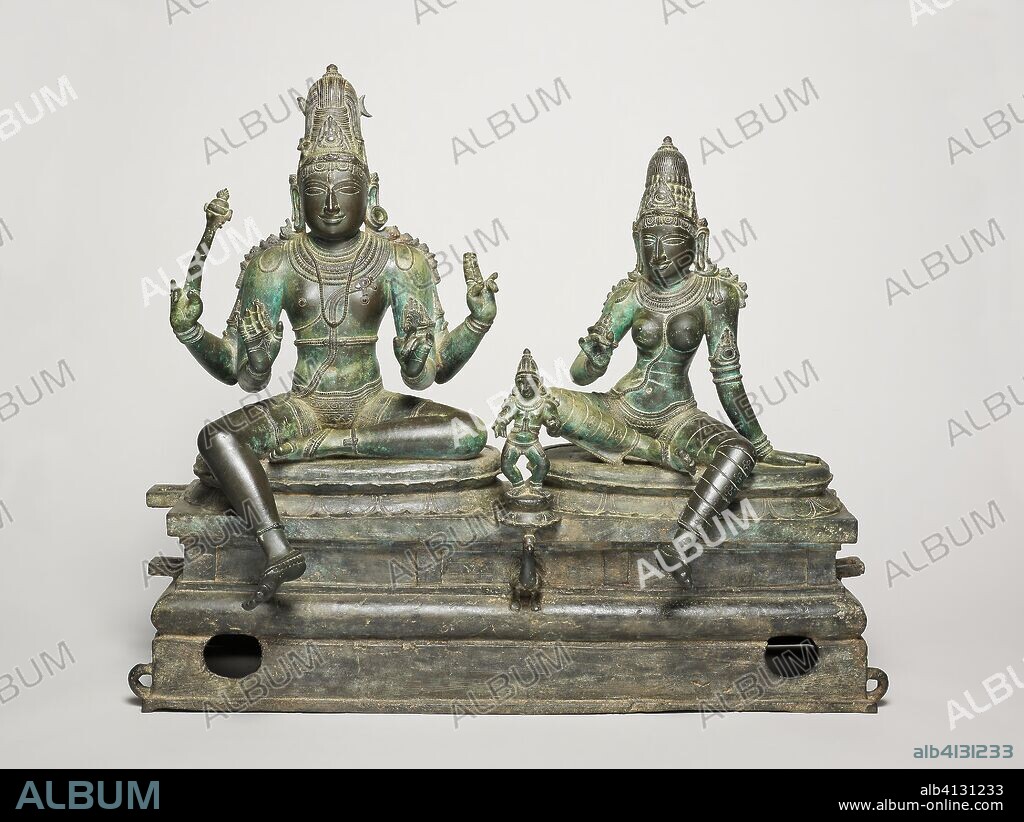 God Shiva and Goddess Uma Seated with Their Son, Skanda (Somaskanda). India; Tamil Nadu. Date: 1350-1450. Dimensions: 62.6 × 75 × 31.4 cm (25 × 28 1/2 × 12 3/8 in.). Bronze. Origin: Tamil Nadu.