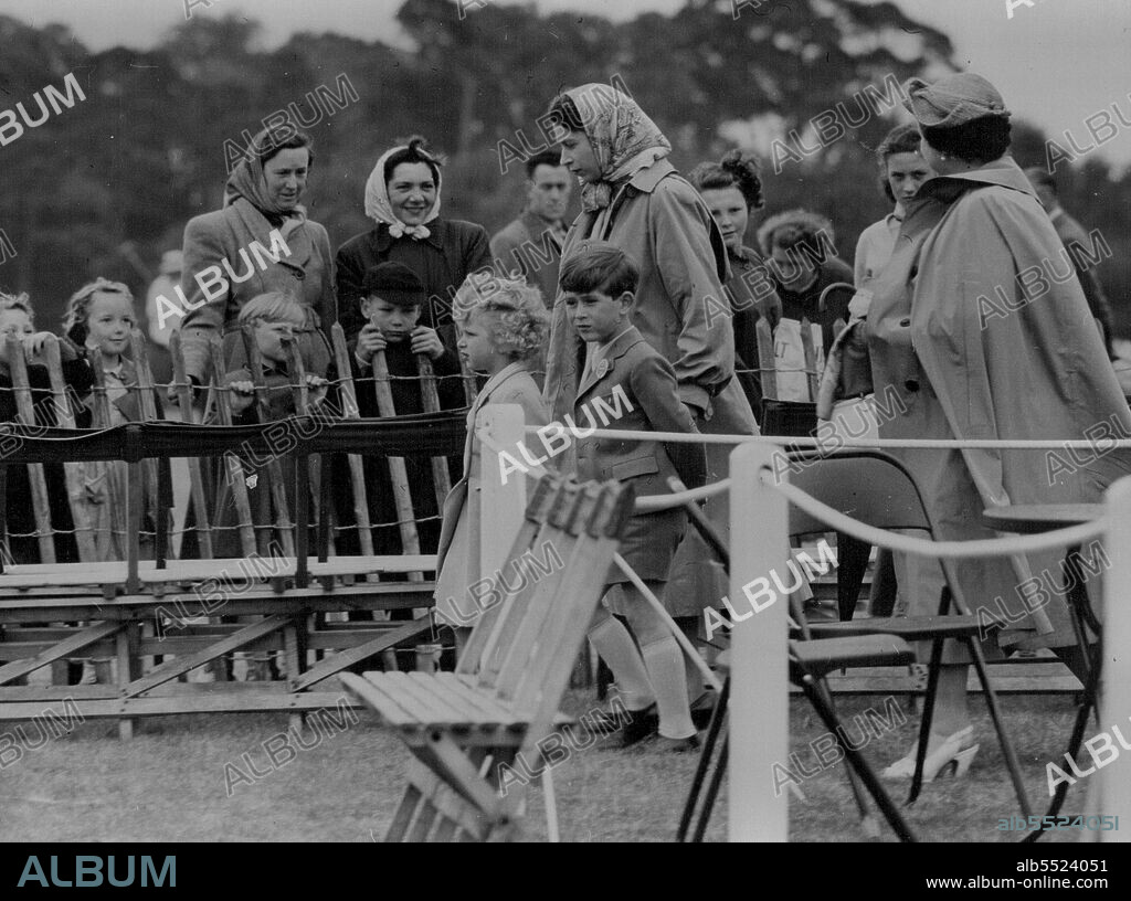 Royal Children Size Windsor Polo The Queen wearing a headscarf escorts her  two children, Prince Charles and Princess Anne, to the stands for the Royal  Windsor Polo tournam - Album alb5524051