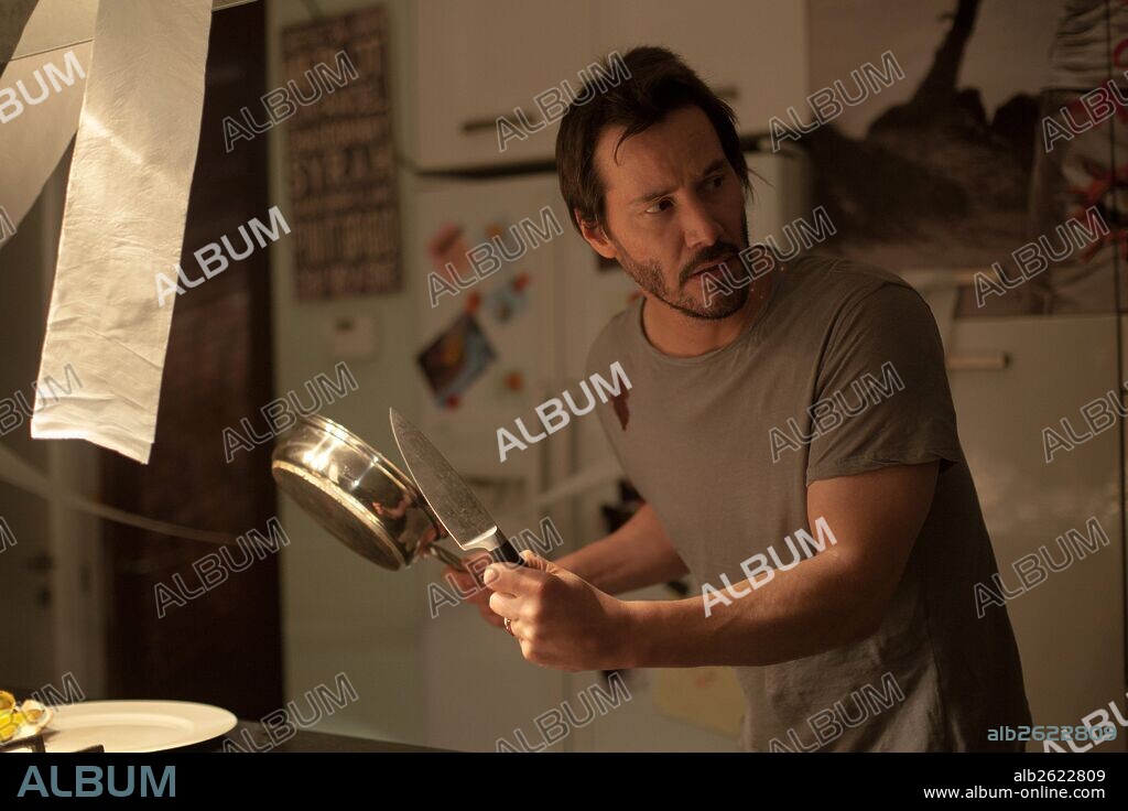 KEANU REEVES in KNOCK KNOCK, 2015, directed by ELI ROTH. Copyright DRAGONFLY ENTERTAINMENT / MORENO, EDUARDO.