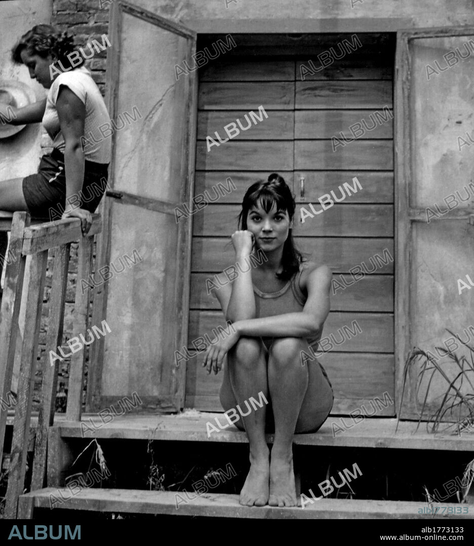 Elsa Martinelli offstage. The Italian actress Elsa Martinelli posing in front of a farmhouse during the shooting of the movie 'La risaia' at the farm called 'La Graziosa'. Casalino, August 1955.