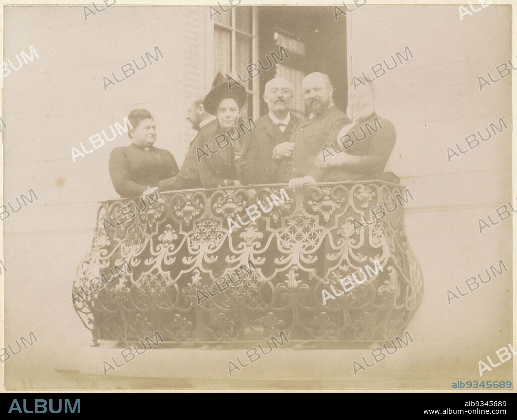 Group portrait of a French family on the balcony of a house, Part of Photo  album of a French amateur photographer with shots of a family, distillery  Delizy & Doistau F -