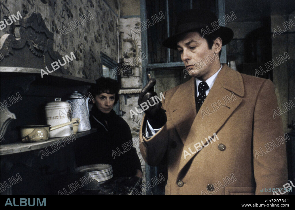 ALAIN DELON and SUZANNE FLON in MR. KLEIN, 1976, directed by JOSEPH LOSEY. Copyright BASIL FILM.