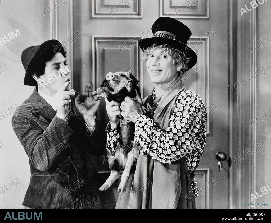 CHICO MARX and HARPO MARX in HORSE FEATHERS, 1932, directed by NORMAN Z. MCLEOD. Copyright PARAMOUNT PICTURES.