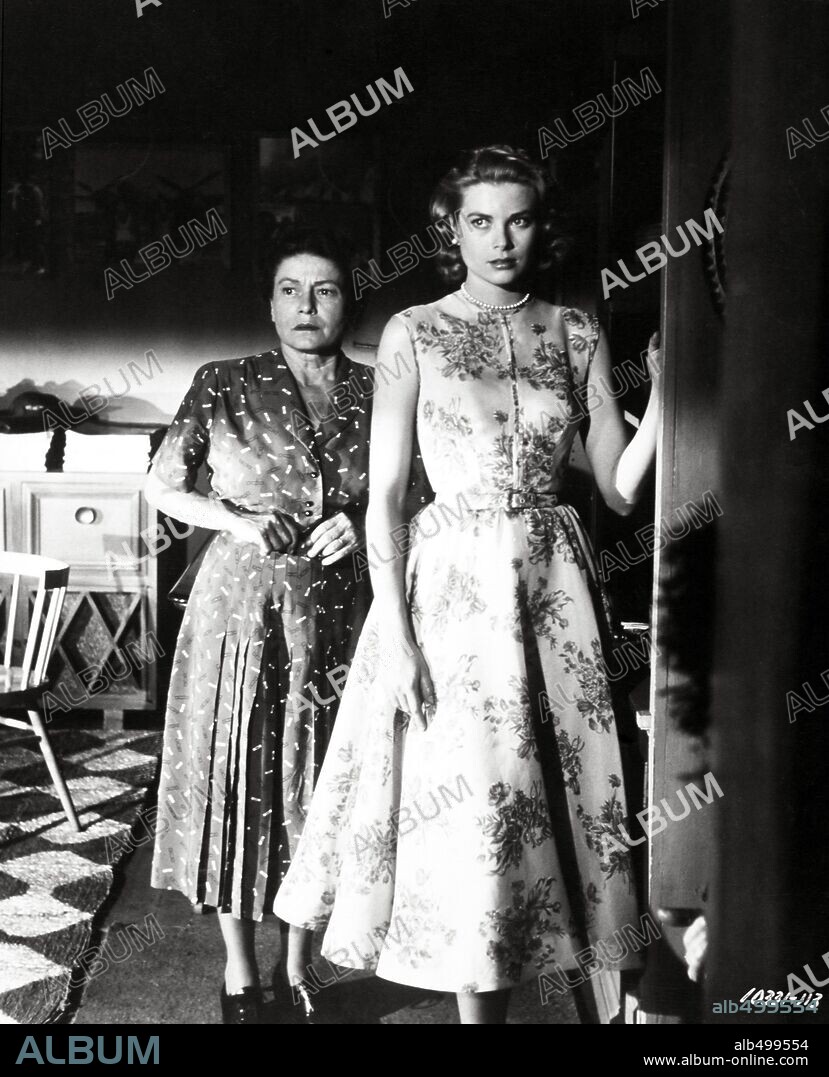 GRACE KELLY and THELMA RITTER in REAR WINDOW, 1954, directed by ALFRED HITCHCOCK. Copyright PARAMOUNT PICTURES.