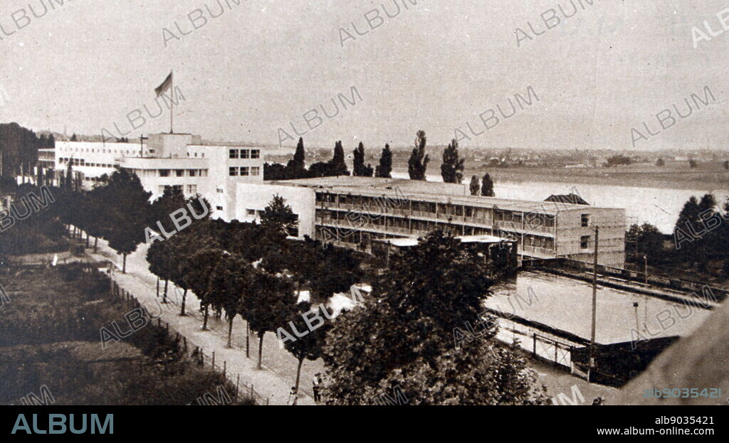 The Bundeshaus (Federal House) is a building complex in Bonn, Germany, which served as the Provisional Parliament House of West Germany, and the seat of the German Bundestag and Bundesrat, from 1949 until 1999. The main building, constructed between 1930 and 1933, served as a Pedagogical Academy until the end of the Second World War. After the resolution of the Hauptstadtfrage [de] (Capital Question) in 1949 in favor of Bonn, the structure was converted into the provisional seat of the Bundestag and Bundesrat.