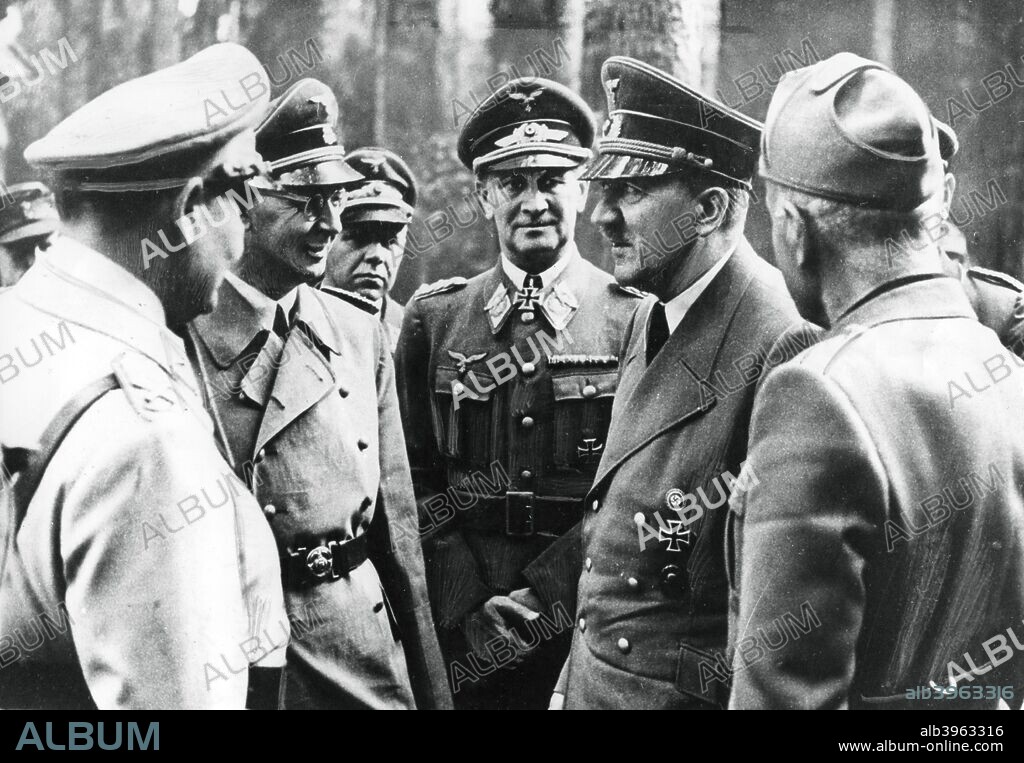 Adolf Hitler with Benito Mussolini and senior Nazis, 1944. The photograph was taken after the unsuccessful attempt on Hitler's life on 20 July 1944. Left to right: Reichsmarschall Hermann Goering, Reichsfuhrer Heinrich Himmler, Colonel General Loerzer, Hitler, Mussolini.