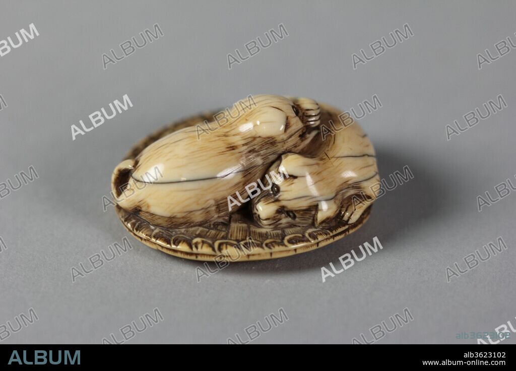 Netsuke of Two Dogs. Culture: Japan. Dimensions: H. 1 in. (2.5 cm); W. 1 3/4 in. (4.4 cm); D. 1 3/4 in. (4.4 cm). Date: 19th century.