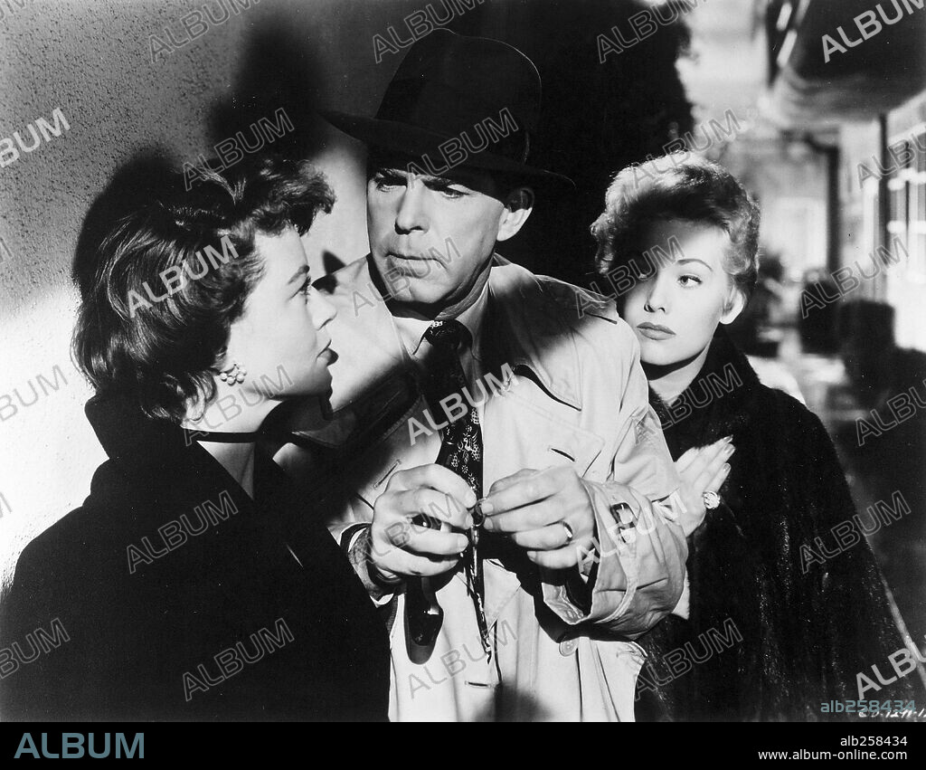 DOROTHY MALONE, FRED MACMURRAY and KIM NOVAK in PUSHOVER, 1954, directed by RICHARD QUINE. Copyright COLUMBIA PICTURES.