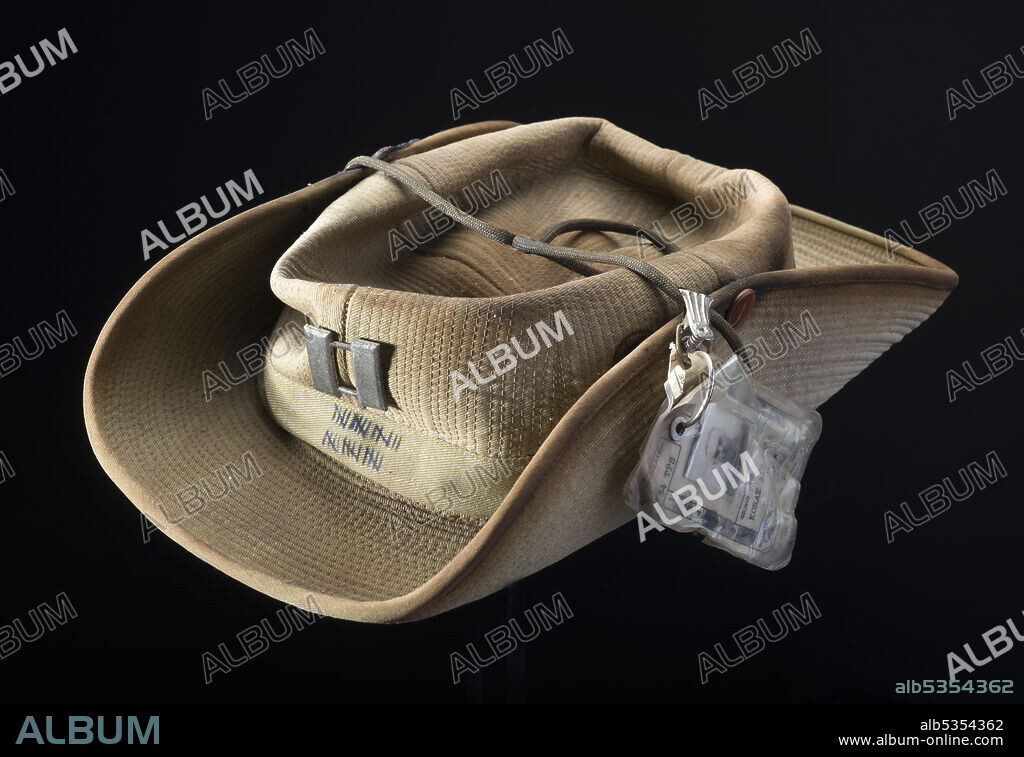 Bush hat worn by United States Air Force pilot, Vietnam War, 1960s. A non-regulation Australian style bush hat worn by members of the United States Air Force serving in Thailand during the Vietnam War. The "Go to Hell Hat" was a Thai-made Australian Bush hat worn by F-105 pilots and their Electronic Weapon's Officer (EWO) who were stationed in Thailand at Takhli and Korat. 'When a new pilot arrived at Takhli or Korat, he immediately purchased a 'go to hell hat' (an) Australian bush hat at the Post Exchange. For each mission flown against North Vietnam, he etched a black hash mark on the front of the hat; for missions into the Hanoi area (Route Package 6), he penned a red mark on the hat. Status in an F-105 Squadron often boiled down to how many red and black hash marks a pilot wore, with the ultimate status symbol being the 100-missions patch he received at the end of a tour.'.