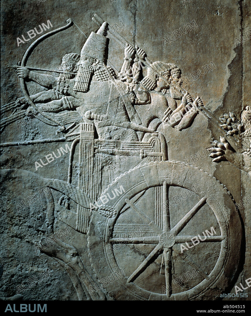 Assyrian relief from Palace at Nineveh 650 BC King Assurbanipal on his chariot.