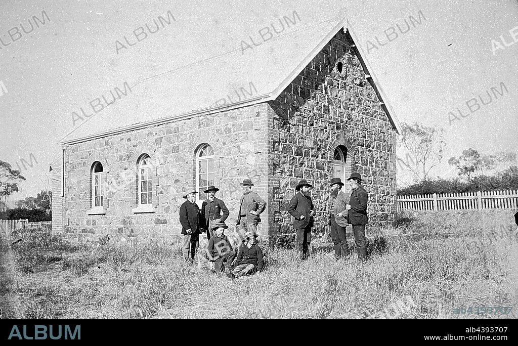 Negative - Cashel, Victoria, circa 1890, A group of men in front of the Cashel Union Church. The church was built in 1873 from local stone and was pulled down in 1966.