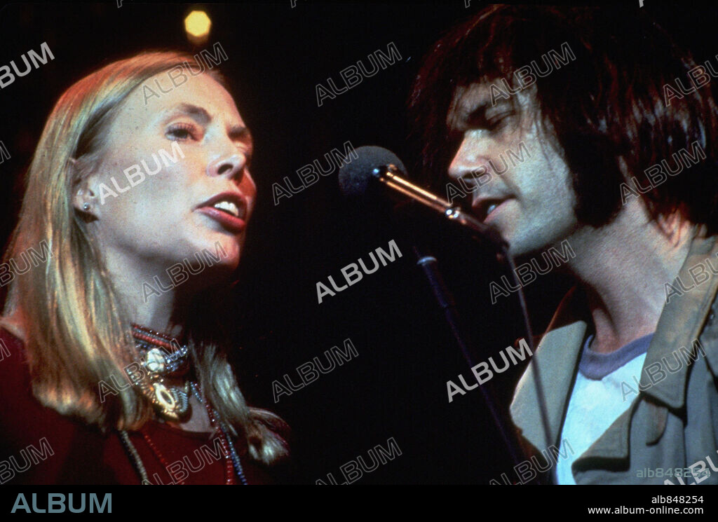 JONI MITCHELL and NEIL YOUNG in THE LAST WALTZ, 1978, directed by ...