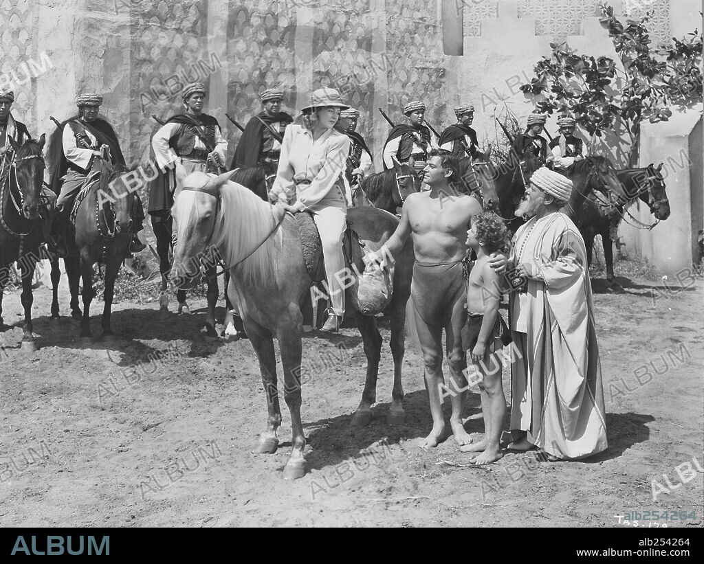 JOHNNY SHEFFIELD, JOHNNY WEISSMULLER and NANCY KELLY in TARZAN'S DESERT MYSTERY, 1943, directed by WILHELM THIELE. Copyright RKO.